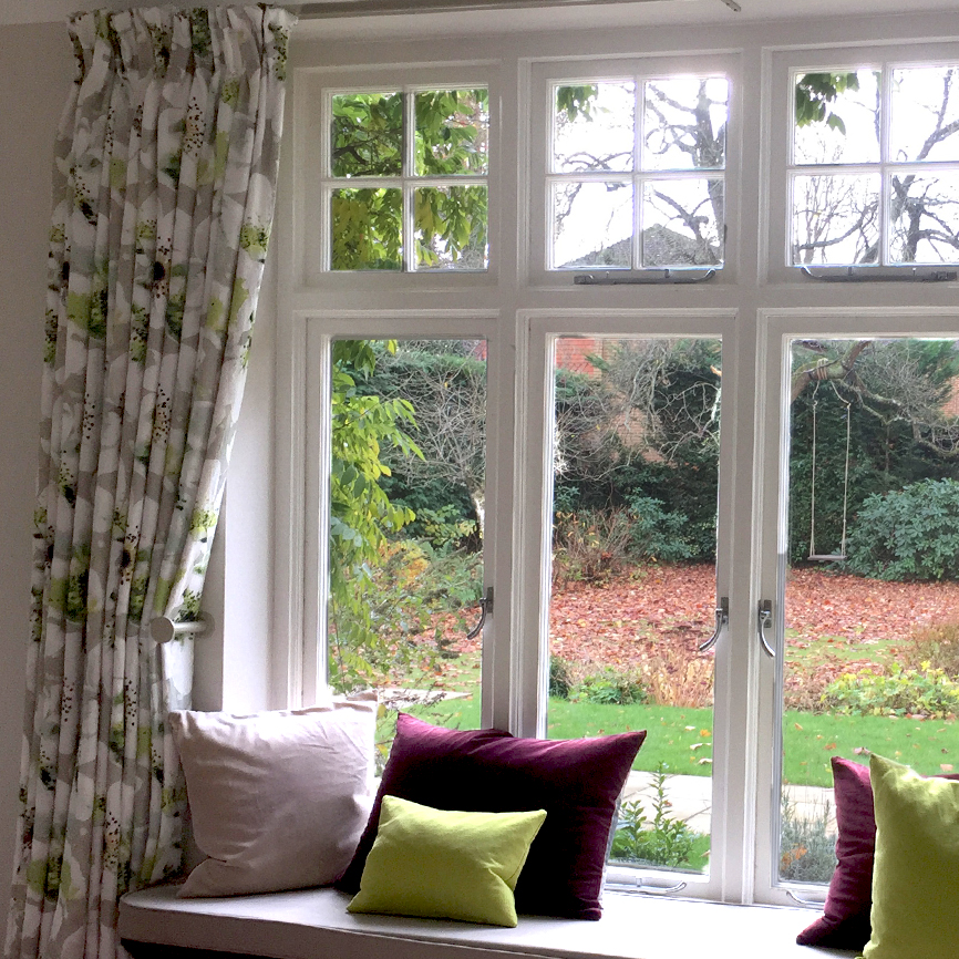 Family Room curtains on Bradley Pole, Seat cushion and scatter cushions. Surrey.